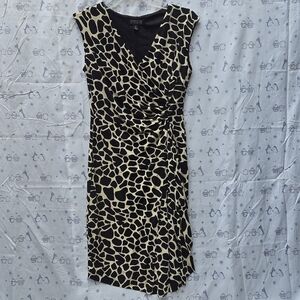 En Focus Studio black and beige giraffe print ruched sleeveless dress.
